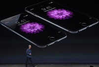 Apple introduces larger iPhones, new watch