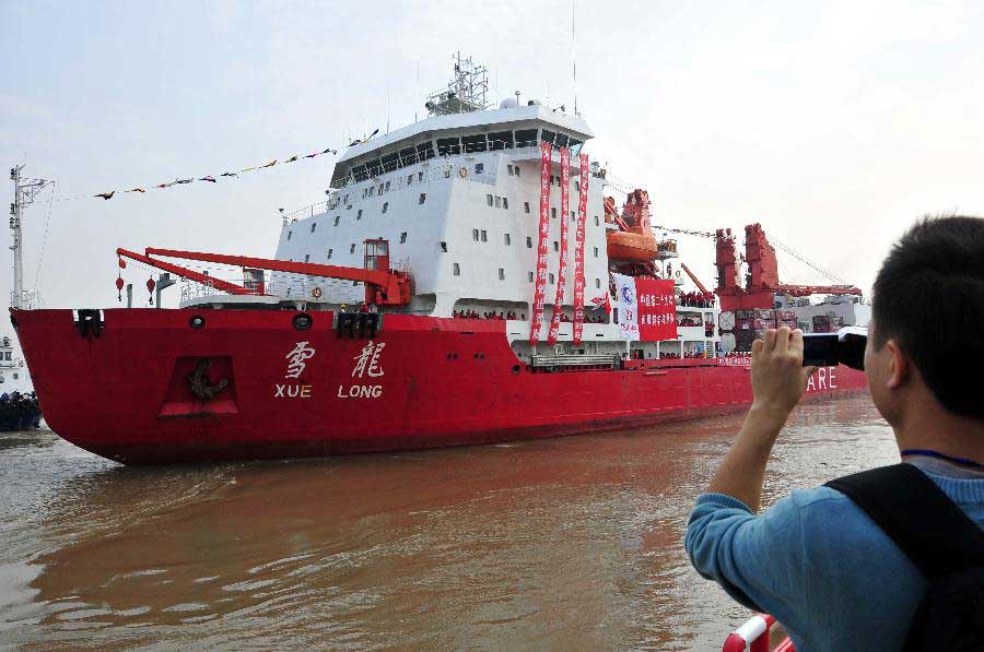 The icebreaker Xuelong ships off a harbor in Guangzhou City, capital of south China's Guangdong Province, Nov. 5, 2012. Chinese research vessel and icebreaker Xuelong, or "Snow Dragon," left Guangzhou on Monday for the country's 29th scientific expedition to Antarctica. (Xinhua/Huang Guobao) 