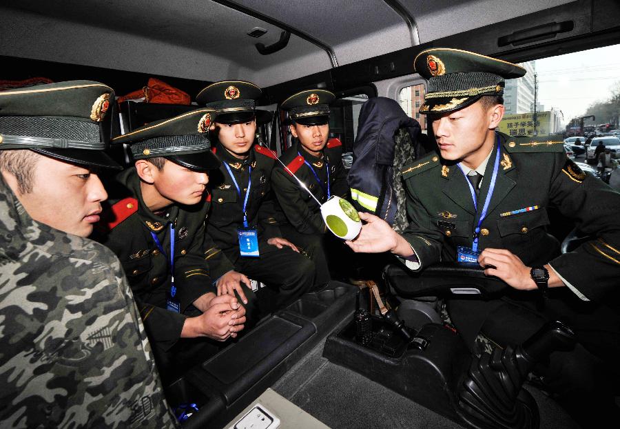 Fire fighters listen to the radio reporting the opening ceremony of the 18th National Congress of the Communist Party of China (CPC) in Changchun of northeast China's Jilin province, Nov. 8, 2012. The 18th CPC National Congress was opened in Beijing on Thursday. (Xinhua/Wang Haofei)