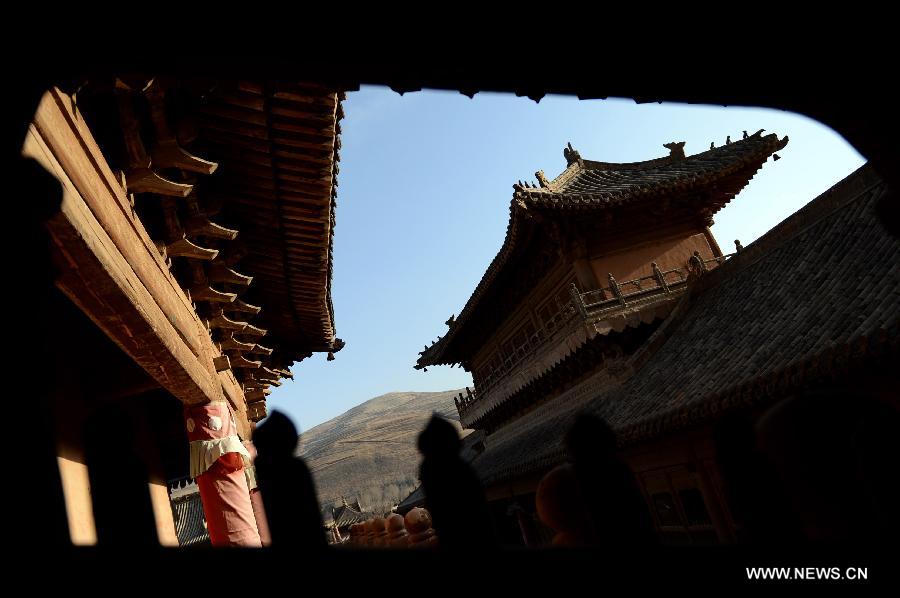 Photo taken on Nov. 10, 2012 shows a view of the Qutan Temple in Ledu County, northwest China's Qinghai Province. The Qutan Temple of the Tibetan Buddhism started to be built in 1393 during ancient China's Ming Dynasty (1368-1644). (Xinhua/Wang Bo)
