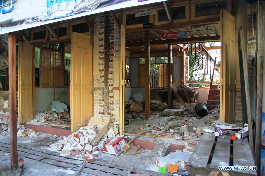 A damaged house is seen at Tabaitgine, Myanmar's quake epicenter, in Myanmar's Mandalay region, Nov. 11, 2012. A strong earthquake measuring 6.8 on the Richter scale struck Myanmar's northern Mandalay region Sunday morning, according to Nay Pyi Taw Hydrology and Meteorology Department. At least 6 people dead and 64 people injured in the earthquake. (Xinhua/Hou Baoqiang)