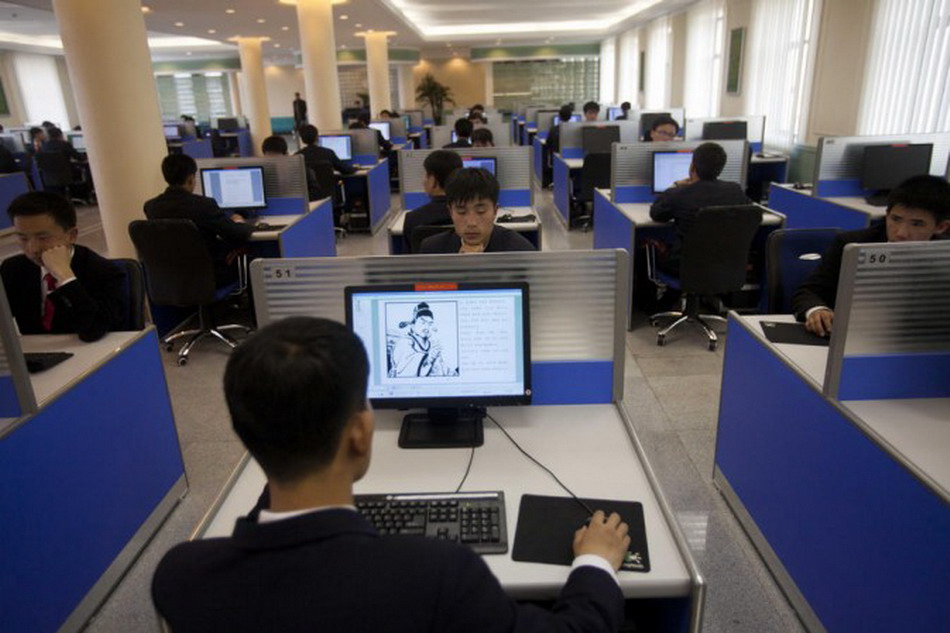 Students use computers at library at Kim II Sung University in Pyongyang. (Photo/Xinhua)
