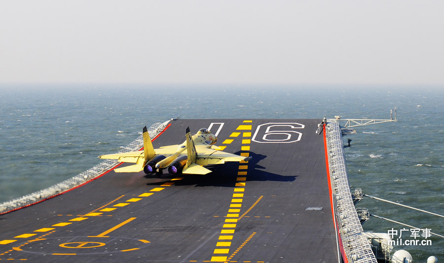Photo shows carrier-borne J-15 fighter jet taking off from China's first aircraft carrier, the Liaoning. (mil. cnr.cn/ Sun Li)