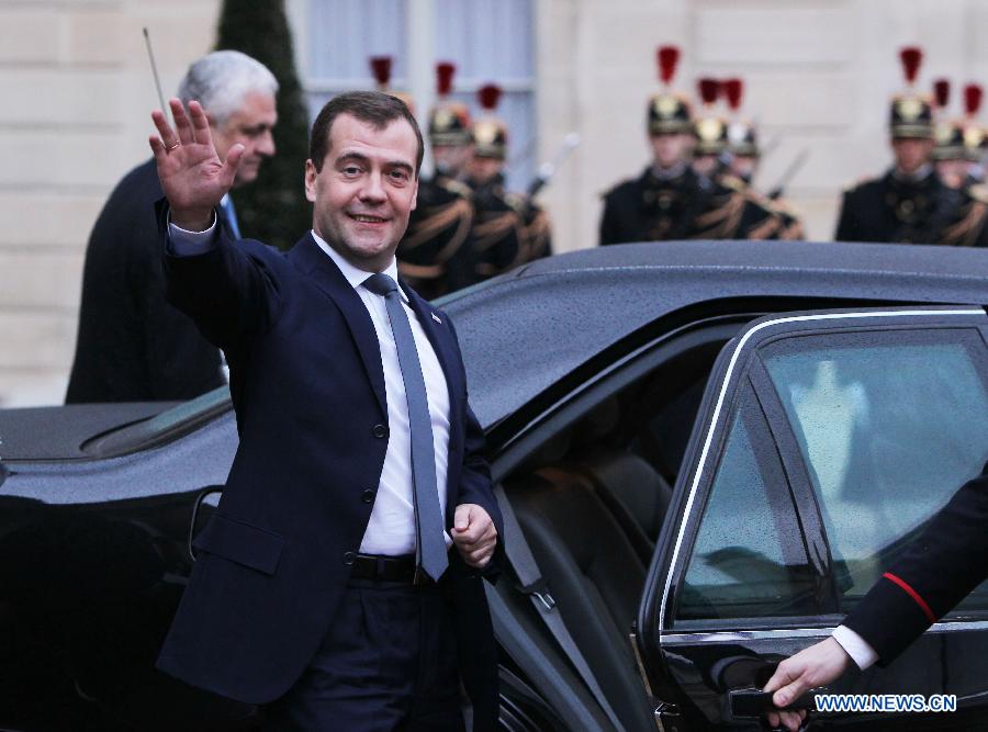 Visiting Russian Prime Minister Dmitry Medvedev leaves the Elysee presidential palace after meeting with French President Francois Hollande in Paris, France, Nov. 27, 2012. (Xinhua/Gao Jing)