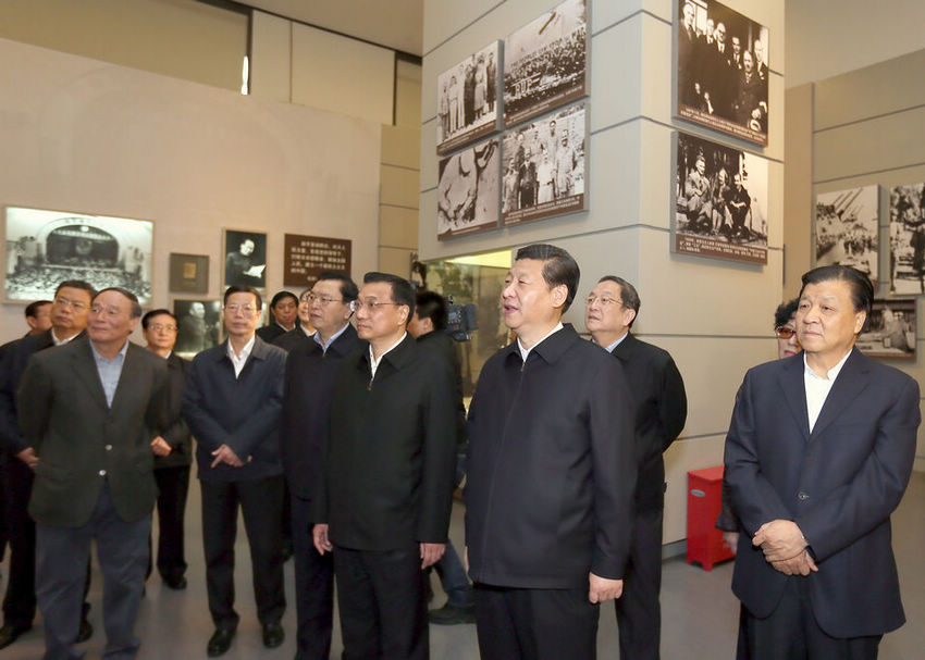 Xi Jinping, general secretary of the Communist Party of China (CPC) Central Committee, views "The Road Toward Renewal" exhibition in Beijing Thursday,  along with other members of the Standing Committee of the CPC Central Committee Political Bureau.(Ju Peng/Xinhua)