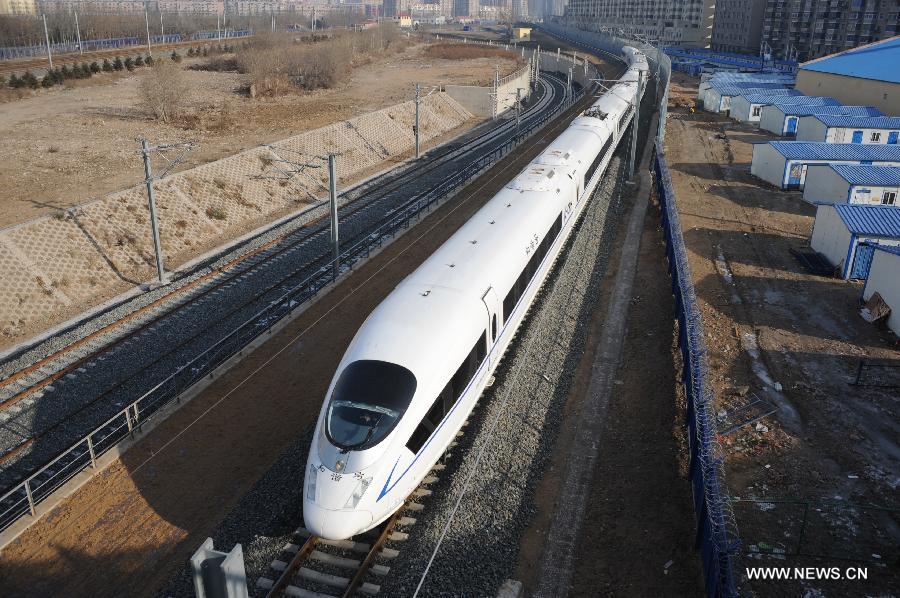 A high-speed train leaves the Shenyang North Railway Station in Shenyang, capital of Liaoning, Dec. 1, 2012.  (Xinhua)