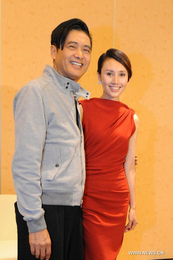 Actor Chow Yun Fat (L) and actress Yolanda Yuan pose for a photo at the premiere press conference of the movie "The Last Tycoon" during the Screen Singapore 2012 held in Marina Bay Sands, Singapore, Dec. 4, 2012. (Xinhua/Then Chih Wey)