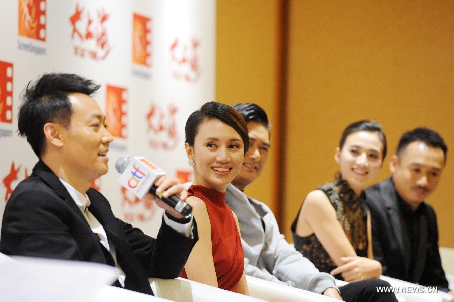 Actors Xin Baiqing, Yolanda Yuan, Chow Yun Fat, Joyce Feng and Gao Hu (From L to R) attend the premiere press conference of the movie "The Last Tycoon" during the Screen Singapore 2012 held in Marina Bay Sands, Singapore, Dec. 4, 2012. (Xinhua/Then Chih Wey)