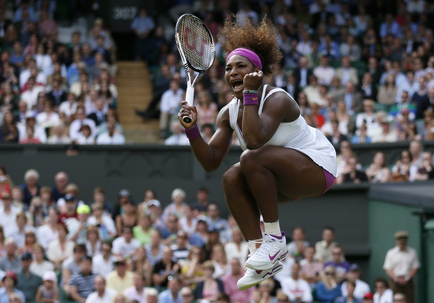 Serena Williams celebrates her success after beating Chinese player Zheng Jie at Wimbledon Women’s Tennis Tournament on June 30, 2012. (Reuters/Stefan Wermuth)
