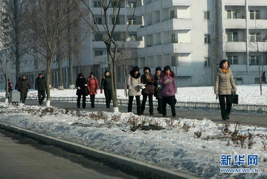 Citizens walk on the street in Pyongyang, DPRK on Dec 12, 2012. Celebrations were held in Pyongyang after the country successfully launched a Kwangmyongsong-3 satellite on Wednesday. (Xinhua/ Zhang Li) 