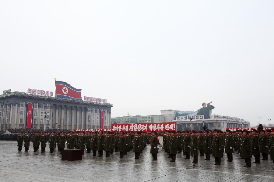 Military officers, soldiers and civilians gather to celebrate the successful launch of the Kwangmyongsong-3 satellite in Pyongyang, capital of the Democratic People's Republic of Korea (DPRK), on Dec. 14, 2012. According to the DPRK's official media KCNA, a Unha-3 rocket carrying the second version of the Kwangmyongsong-3 satellite blasted off from the Sohae Space Center in Cholsan County, North Phyongan Province, on Dec. 12. (Xinhua/Zeng Tao)