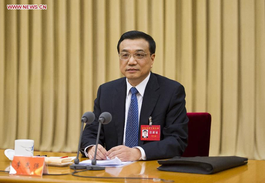 Photo released on Dec. 16, 2012 shows Li Keqiang, member of the Standing Committee of the Political Bureau of the Communist Party of China (CPC) Central Committee, presiding over the central economic work conference in Beijing, capital of China. (Xinhua/Li Xueren)