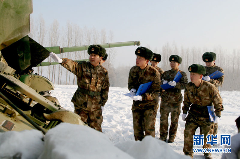An armored regiment under the Shenyang Military Area Command of the Chinese People's Liberation Army (PLA) took its troops to unfamiliar area on December 16, 2012 to conduct drill on such subjects as rapid maneuvering and coordination of infantrymen and tanks, in a bid to temper its troops in an all-round way. (Xinhua/Xu Zhilin)