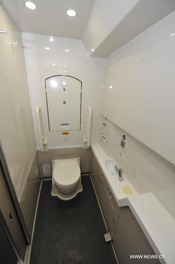 The interior of a toilet for disabled people on G80 express train is pictured during a trip to Beijing, capital of China, Dec. 22, 2012.