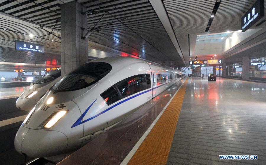 High-speed train G502 leaves the Changsha South Railway Station in Changsha, capital of central China's Hunan Province, Dec. 26, 2012. The Changsha South Railway Station is one of the stops of the 2,298-kilometer Beijing-Guangzhou High-speed Railway, the world's longest, which was put into operation on Wednesday. (Xinhu/Li Ga) 