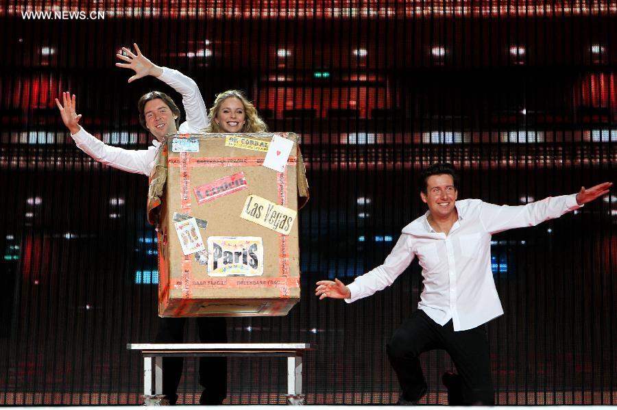 Dutch magicians perform during a rehearsal of the China Central Television (CCTV)'s 2013 New Year Gala in Beijing, capital of China, Dec. 30, 2012. The gala will be shown in the evening of Dec. 31. (Xinhua/Zheng Huansong) 