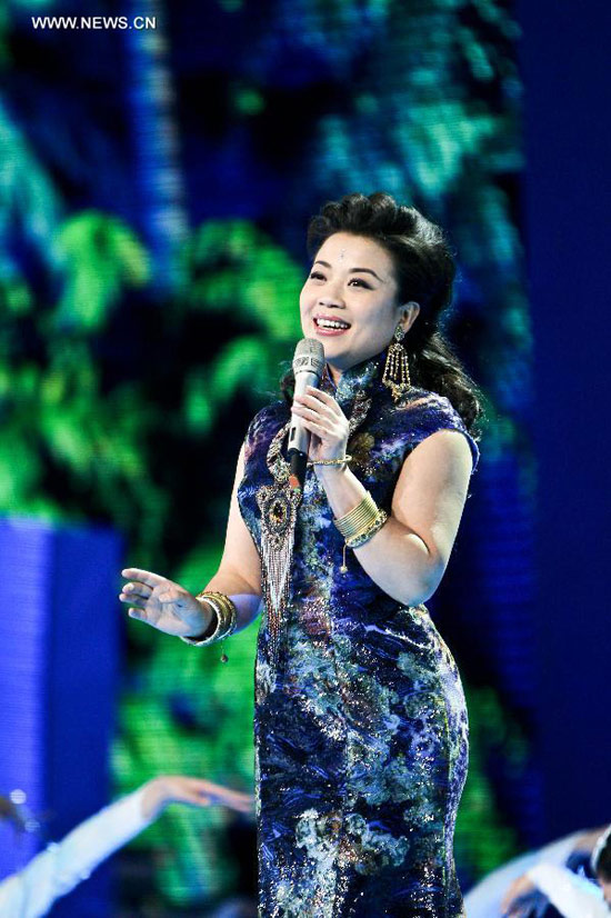 Singer Zhang Ye performs during a rehearsal of the China Central Television (CCTV)'s 2013 New Year Gala in Beijing, capital of China, Dec. 30, 2012. The gala will be shown in the evening of Dec. 31. (Xinhua/Zheng Huansong) 