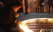 Hangzhou citizens mourn for deceased firefighters