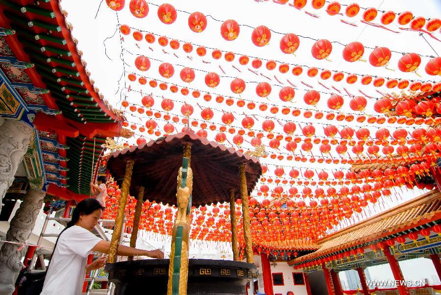 Red lanterns are seen in Thean Hou Temple in Kuala Lumpur, capital of Malaysia, on Jan. 7, 2013. Red lanterns are decorated to greet the upcoming Chinese Lunar New Year, Year of the Snake. (Xinhua/Chong Voon Chung) 