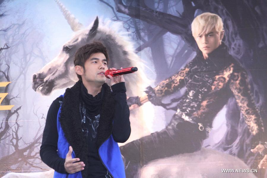 Pop singer Jay Chou performs at an autograph session promoting his new album "Opus 12", in Taipei, southeast China's Taiwan, Jan. 12, 2013. (Xinhua) 