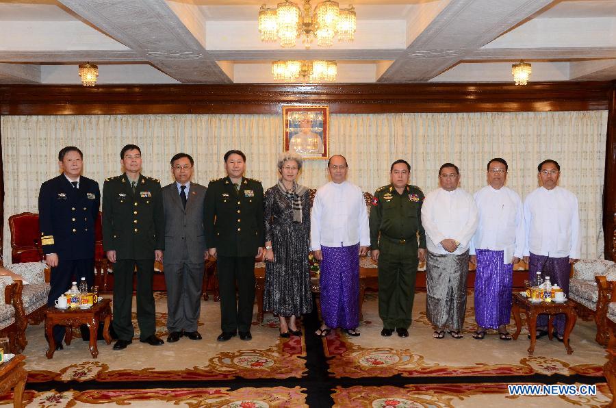 Representatives from both sides pose for group photos after the meeting between Myanmar President U Thein Sein and visiting Special Envoy of the Chinese Government Fu Ying in Yangon, Myanmar, Jan. 19, 2013. Fu Ying, who is also Chinese vice foreign minister, arrived in Yangon on Saturday. (Xinhua/Jin Fei) 