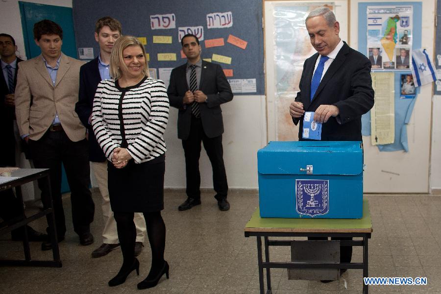 Israeli Prime Minister and the leader of Likud, Benjamin Netanyahu casts his ballot at a polling station during the parliamentary election in Jerusalem, on Jan. 22, 2013. Israel held parliamentary election on Tuesday. (Xinhua/Pool/Uriel Sinai)