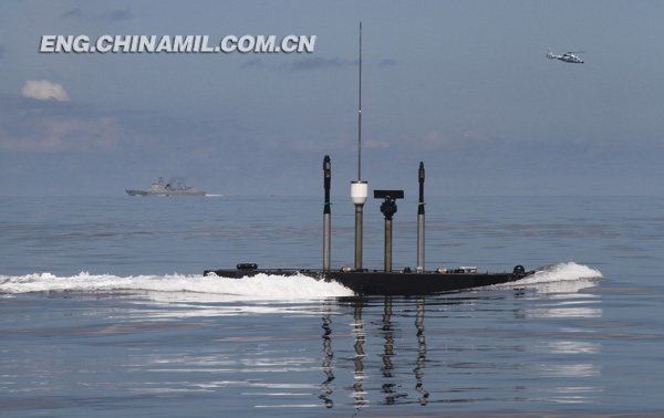 Upon its arrival at the predetermined sea area, the submarine started the drill of laying underwater mines. (China Military Online) 