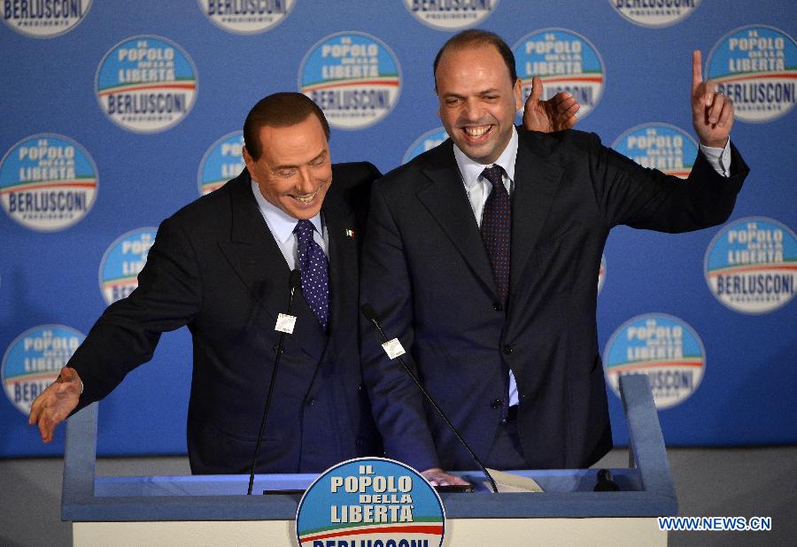 Italy's former Prime Minister Silvio Berlusconi (L) and People of Freedom Party (PDL) secretary Angelino Alfano deliver a speech during a campaign rally to present the list of the PDL candidates for the upcoming general elections, in Rome on January 25, 2013. (Xinhua/Alberto Lingria) 