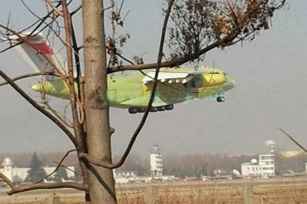 The prototype of China's first indigenously-developed heavy transport aircraft, Y-20, takes off from an unidentified airport for its first test flight Saturday afternoon, January 26, 2013. (Photo/Xinhua)