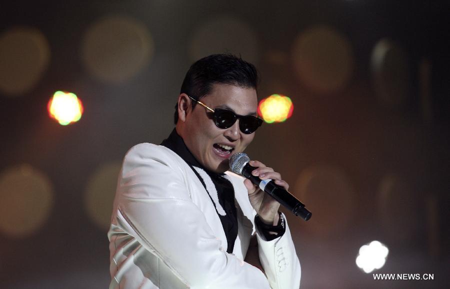 South Korean singer Psy sings his hit single "Gangnam Style" during a concert at Nanjing Olympic Sports Center in Nanjing, capital of east China's Jiangsu Province, Feb. 2, 2013. It is the first time for Psy to participate in commercial performance on the Chinese mainland. (Xinhua/Yan Minhang)