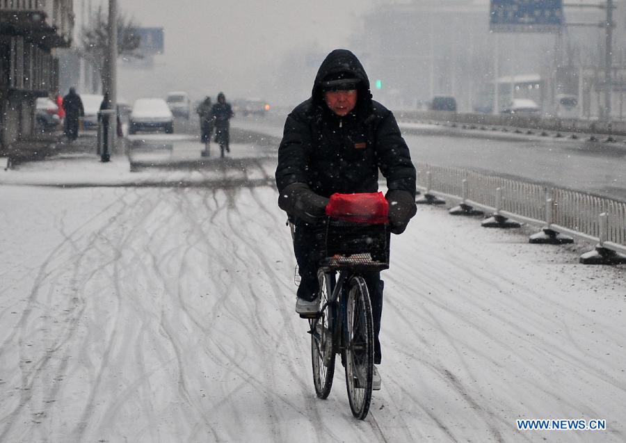 Cold snap brings snow to most parts of China
