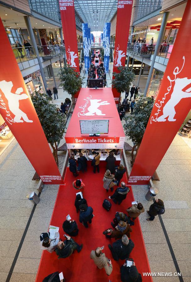 People queue to buy the tickets of the upcoming 63rd Berlinale film festival at the box office in Berlin, capital of Germany, Feb. 6, 2013. The 63rd Berlinale film festival is scheduled to be held from Feb. 7 to 17. (Xinhua/Ma Ning)