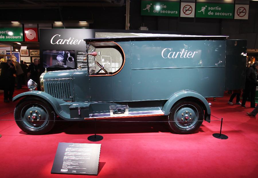 People views a CARTIER retromobile at the 38th Retromobile Salon at Paris Expo Porte de Versailles in Paris, France, Feb. 8, 2013. The annual Retromobile Salon was held here from Feb. 6 to 10, 2013. (Xinhua/Gao Jing) 