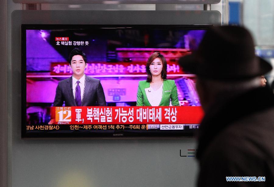 A man watches news reports of the suspected nuclear test by the Democratic People's Republic of Korea, in Seoul, South Korea, Feb. 12, 2013. The South Korean Defense Ministry believed that the Democratic People's Republic of Korea (DPRK) has conducted a nuclear test on Tuesday, a local TV station reported. The DPRK said on Tuesday that it has successfully conducted a third nuclear test to safeguard national security against U.S. hostile policy, the official KCNA news agency reported.  (Xinhua/Park Jin-hee)