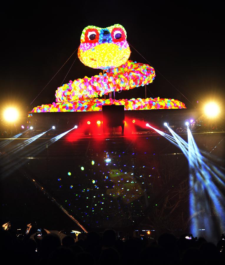 Photo taken on Feb. 16, 2013 shows a snake-shaped lantern during a trial lighting for the 2013 Taipei lantern festival in Taipei, southeast China's Taiwan. The lantern festival, which is to celebrate the Chinese traditional Lantern Festival, will kick off on Feb. 21. The Lantern Festival falls on the 15th day of the first month of the Chinese lunar calendar, or Feb. 24 this year. (Xinhua/Wu Ching-teng) 