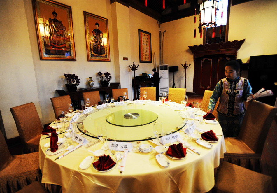 A photo shows a dining room in Guigongfu Royal Club in Beijing, which serves imperial healthy dishes. (Photo/ Imagine China)