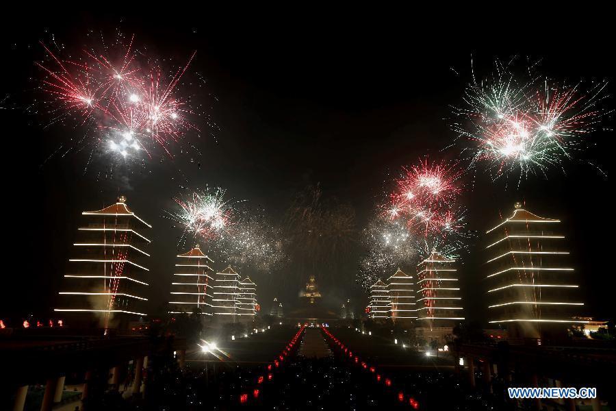 Photo taken on Feb. 22, 2013 shows the fireworks during a lantern show celebrating the Spring Festival at Fo Kwang Mountain in Kaohsiung, southeast China's Taiwan. The lantern show will last until March 11. (Xinhua/Xing Guangli) 