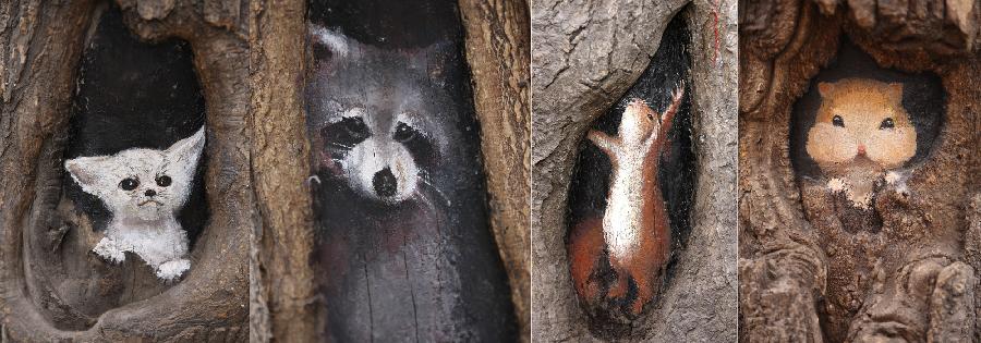 Combo photo taken on March 1, 2013 shows tree hollow paintings created by Wang Yue, a local college student, at Jiuzhong Street in Shijiazhuang, capital of north China's Hebei Province. (Xinhua/Ding Lixin)