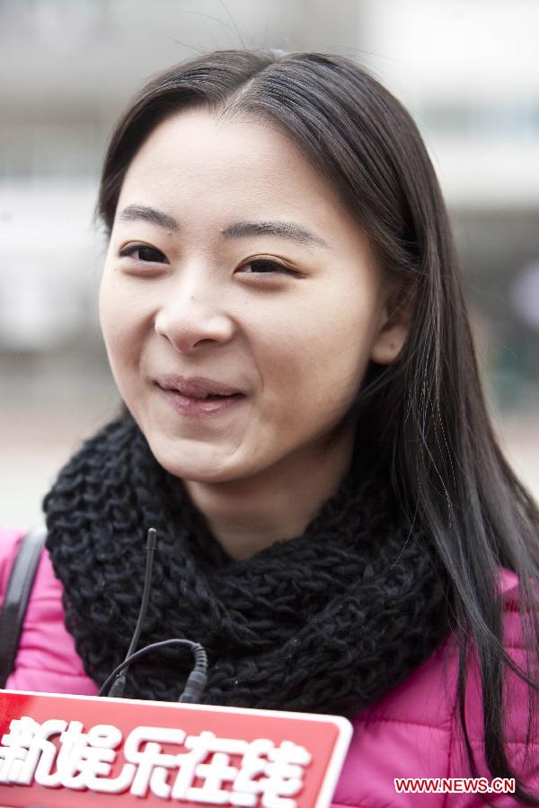 An applicant for the Performance Institute of Beijing Film Academy (BFA) receives interview in Beijing, capital of China, March 2, 2013. She has been selected for the third round of the entrance exam of Performance Institute. A total of 404 people entered the third round of the exam while the institute plans to recruit 75 freshmen for 2013. The Performance Institute of BFA has cultivated lots of movie and TV stars in China. (Xinhua/Zhao Bing)