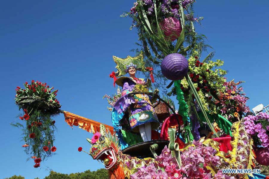 A dragon float is seen during the flowers parade of the 129th annual Nice Carnival parade, in Nice, southern France, March 2, 2013. (Xinhua/Gao Jing) 
