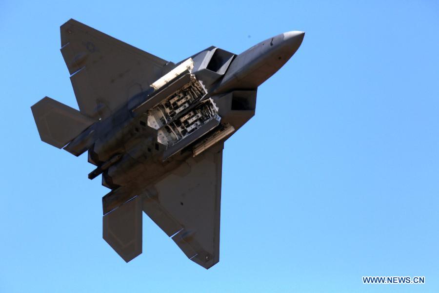 A U.S. Air Force F-22A Raptor performs during the Australian International Airshow in Melbourne on March 2, 2013. (Xinhua/Xu Yanyan)