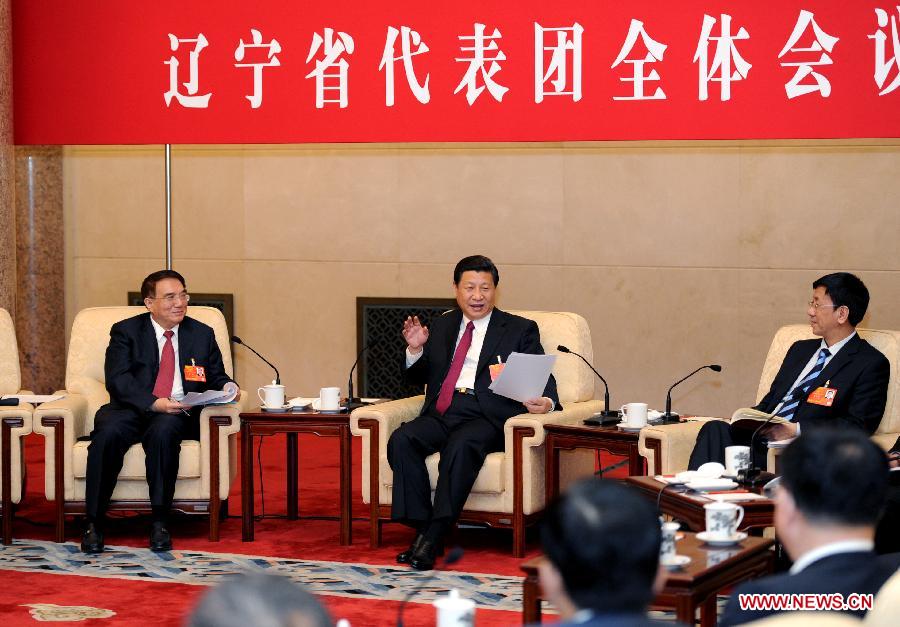 Xi Jinping (C), general secretary of the Central Committee of the Communist Party of China (CPC), joins a panel discussion with deputies from northeast China's Liaoning Province, who attend the first session of the 12th National People's Congress (NPC), in Beijing, capital of China, March 6, 2013. (Xinhua/Xie Huanchi)