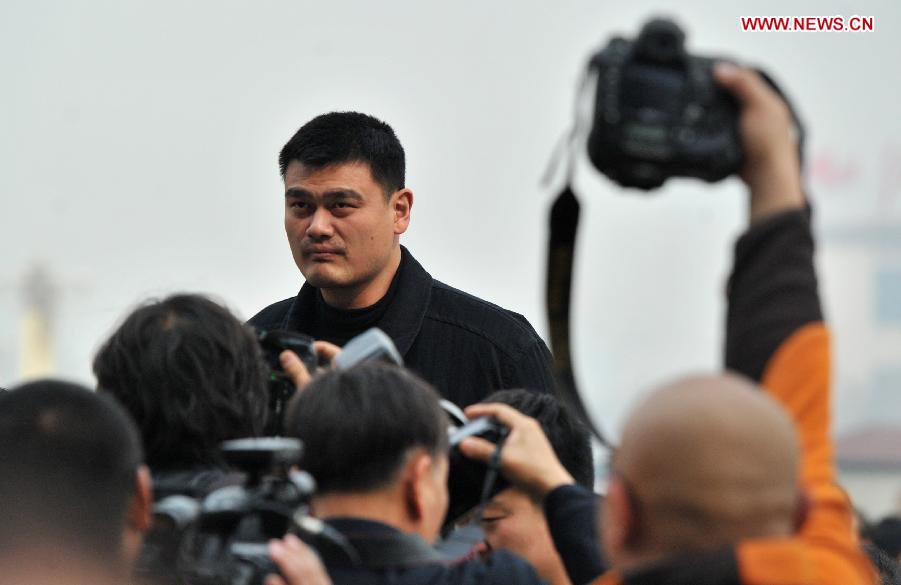 Yao Ming, a member of the 12th National Committee of the Chinese People's Political Consultative Conference (CPPCC), arrives at the Tian'anmen Square in Beijing, capital of China, March 7, 2013. The second plenary meeting of the first session of the 12th CPPCC National Committee will be held in Beijing on Thursday. (Xinhua/Guo Chen)  