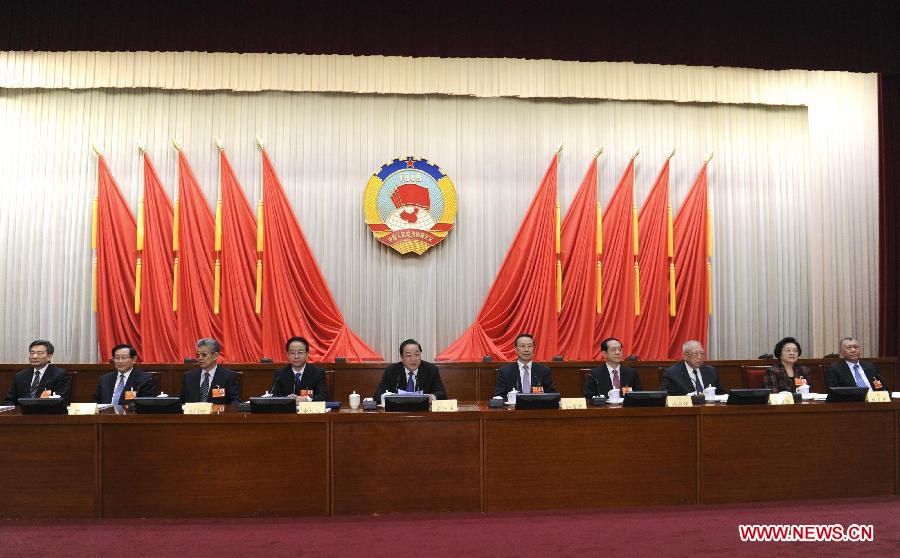 The presidium of the first session of the 12th National Committee of the Chinese People's Political Consultative Conference (CPPCC) hold their second meeting in Beijing, capital of China, March 9, 2013. Yu Zhengsheng presided over the meeting. (Xinhua/Rao Aimin)