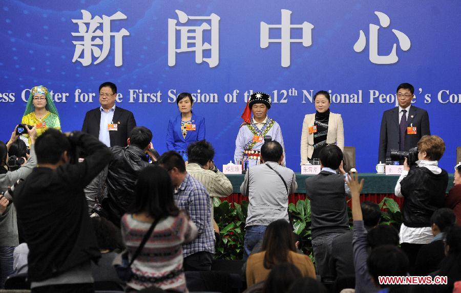 A press conference is held by the first session of the 12th National People's Congress (NPC) in Beijing, capital of China, March 10, 2013. Six grassroots NPC deputies involving farmers and workers were invited to answer questions at the press conference. (Xinhua/Wang Peng)