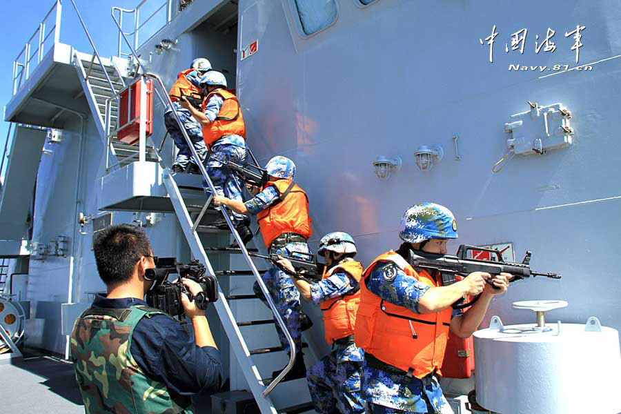 The 14th escort taskforce of the Navy of the Chinese People's Liberation Army (PLA) participates in an anti-hijack exercise on the March 10, 2013, local time, while sailing in the Arabian Sea area on the voyage to the Gulf of Aden. (navy.81.cn/Wang Changsong, Li Ding)