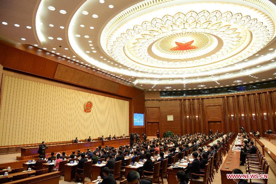 The presidium of the first session of the 12th National People's Congress (NPC) hold their fifth meeting at the Great Hall of the People in Beijing, capital of China, March 14, 2013. Zhang Dejiang, executive chairperson of the presidium, presided over the meeting. (Xinhua/Ma Zhancheng) 