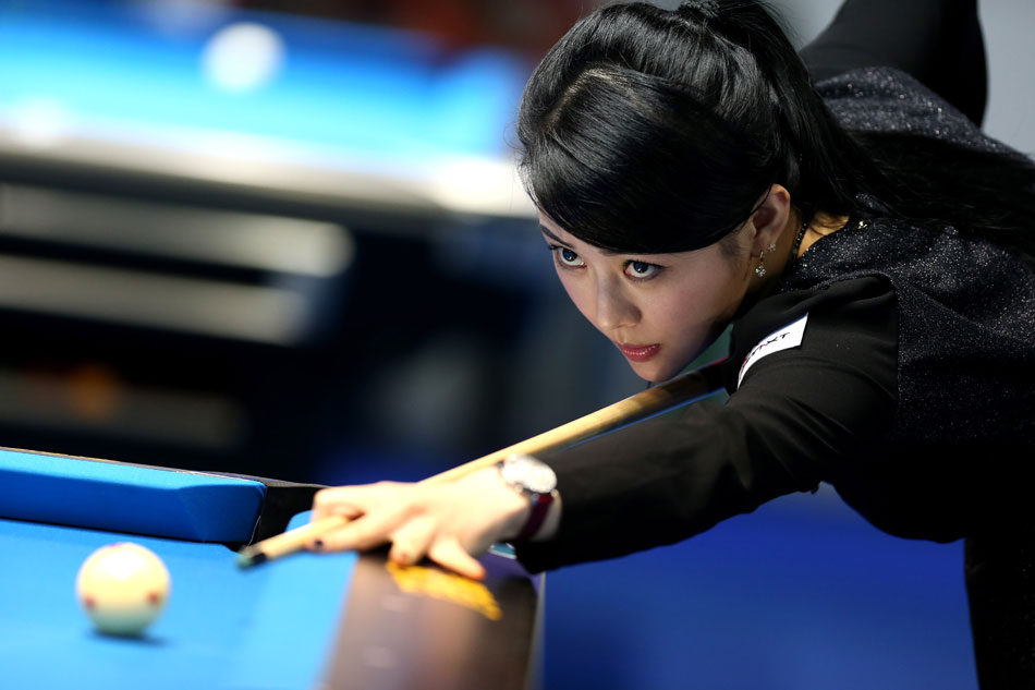 China’s Pan Xiaoting competes during the first day match against Jennifer Barretta of the United States at the 2013 Amway eSpring Women's World 9-Ball Open  in Taipei, March 14, 2013. Pan Xiaoting won 7-3. (Xinhua/Xie Xiudong)