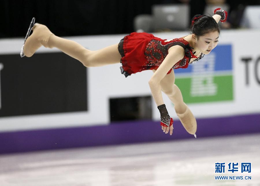 Li Zijun performs in the competition on March 14, 2013. Li Zijun, Chinese contestant, placed twelfth in the short program with a score of 56.31 point at 2013 World Figure Skating Championship in Canada. (Xinhua/Reuters) 