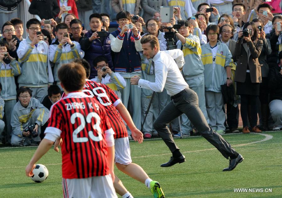 Beckham in Beijing, playing football in suits (2)